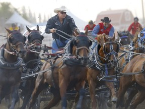 Driver, Kirk Sutherland,RT, Sunday night during heat 2 0f the chuckwagons at the 2021 Strathmore Rodeo in Strathmore on Sunday, August 1, 2021.