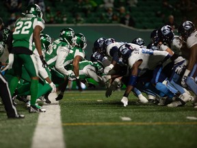 The Saskatchewan Roughriders defence makes a goal line stand against the Toronto Argonauts, stopping John White IV on third and goal from the one on Friday night at Mosaic Stadium in Regina.