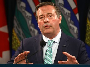 Premier Jason Kenney, along with Health Minister Jason Copping provide an update on COVID-19 and the ongoing work to protect public health at the McDougall Centre in Calgary on Tuesday, Oct. 5, 2021.