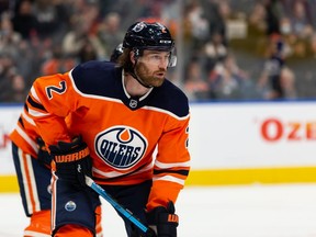 Edmonton Oilers' Duncan Keith (2) is seen during a faceoff with the Vancouver Canucks during the second period of preseason NHL action at Rogers Place in Edmonton, on Thursday, Oct. 7, 2021.