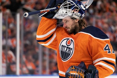 Edmonton Oilers' goaltender Mike Smith (41) plays the Vancouver Canucks during second period NHL action at Rogers Place in Edmonton, on Wednesday, Oct. 13, 2021.