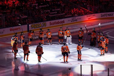 The Edmonton Oilers are introduced before their NHL season opening game versus the Vancouver Canucks at Rogers Place in Edmonton, on Wednesday, Oct. 13, 2021.