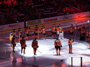 The Edmonton Oilers are introduced before their NHL season opening game versus the Vancouver Canucks at Rogers Place in Edmonton on Wednesday, Oct. 13, 2021.