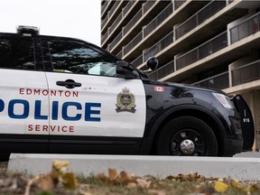 Edmonton Police Service officers are investigating a suspicious death in the Burlington Arms tower apartment complex at 12841 65 Street in Edmonton, on Monday, Oct. 18, 2021.