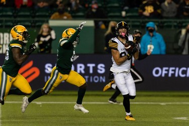 Hamilton Tiger-Cats' Jaelon Acklin (80) scores a touchdown on the Edmonton Elks during first half CFL action at Commonwealth Stadium in Edmonton, on Friday, Oct. 29, 2021.