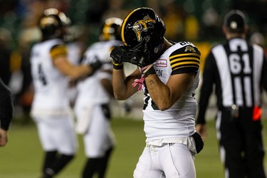 Hamilton Tiger-Cats' Jaelon Acklin (80) scores a touchdown and gestures at the Edmonton Elks during first half CFL action at Commonwealth Stadium in Edmonton, on Friday, Oct. 29, 2021.