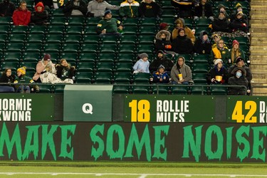 Edmonton Elks fans brave the cold as the team plays the Hamilton Tiger-Cats during first half CFL action at Commonwealth Stadium in Edmonton, on Friday, Oct. 29, 2021.