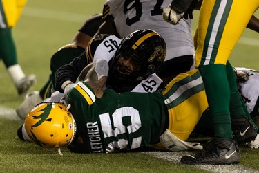 Edmonton Elks' Walter Fletcher (25) scores a touchdown on the Hamilton Tiger-Cats during second half CFL action at Commonwealth Stadium in Edmonton, on Friday, Oct. 29, 2021.