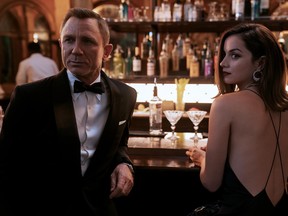 James Bond (Daniel Craig) and Paloma (Ana de Armas) in a scene from No Time to Die.