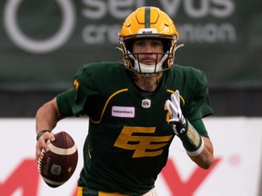 Edmonton Elks quarterback Trevor Harris has been traded to the Montreal Aloeuttes for defensive end Antonio Simmons.