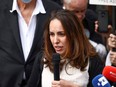 Stella Moris, partner of WikiLeaks founder Julian Assange, speaks to media outside the Royal Courts of Justice in London, Britain, August 11, 2021.