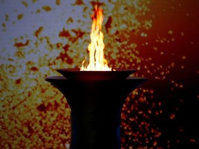 The Olympic flame burns in a cauldron at the ceremony to welcome the flame for the Beijing 2022 Winter Olympics, in Beijing, China October 20, 2021.