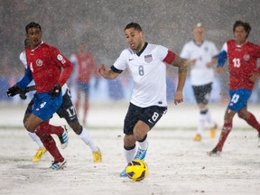 Midfielder Clint Dempsey #8 of the United States dribbles the ball during a FIFA 2014 World Cup Qualifier match between Costa Rica and United States at Dick's Sporting Goods Park on March 22, 2013 in Commerce City, Colorado.