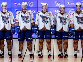 (left to right) Edmonton Oil Kings' Josh Williams (14), Simon Kubicek (5), Jake Neighbours (21), Carter Souch (44), and Dylan Guenther (11) unveil this year’s Teddy Bear Toss jersey during a press conference at Rogers Place in Edmonton, Tuesday Nov. 30, 2021. The Oil Kings' 14th annual Teddy Bear Toss will be held during the December 4, 2022 game against the Moose Jaw Warriors.