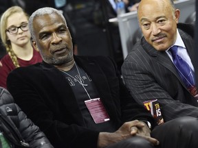 Charles Oakley, left, attends the game between the Cleveland Cavaliers and the New York Knicks at Quicken Loans Arena on Feb. 23, 2017.