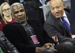 Charles Oakley, left, attends the game between the Cleveland Cavaliers and the New York Knicks at Quicken Loans Arena on Feb. 23, 2017.