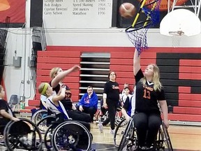Athletes with the Alberta Northern Lights Wheelchair Basketball group play in a gym in 2019. The organization is one of about 300 who receive annual operating grants from the City of Edmonton that are on the chopping block in the 2022 budget.
