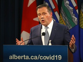 Premier Jason Kenney, along with Health Minister Jason Copping, Justice Minister Kaycee Madu and Alberta's chief medical officer of health, provided an update on COVID-19 and the ongoing work to protect public health at the McDougall Centre in Calgary on Tuesday, Sept. 28, 2021.