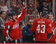Washington Capitals left wing Alex Ovechkin (8) waves to fans while being acknowledged for tying Brett Hull for 4th place in all-time NHL goals scored after a goal against the Buffalo Sabres during the second period at Capital One Arena Nov. 8, 2021.