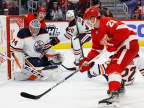 Detroit Red Wings right wing Lucas Raymond (23) skates in on Edmonton Oilers goaltender Stuart Skinner (74) in the second period at Little Caesars Arena. Mandatory Credit: