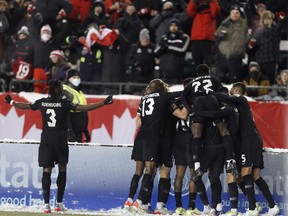 Canada celebrates their first goal against Mexico in added time in the first half at Commonwealth Stadium in Edmonton. Canada defeated Mexico 2-1 on November 16, 2022. Greg Southam / Postmedia