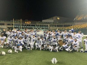 The Harry Ainlay Titans celebrate their provincial championship after defeating the St. Francis Browns 28-2 at Commonwealth Stadium on Nov. 27, 2021.