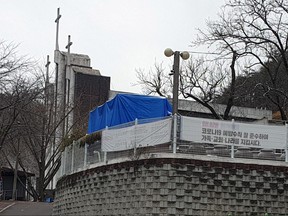 A church in a religious community where many people had tested positive for COVID-19 is seen in Cheonan, South Korea, Nov. 23, 2021.