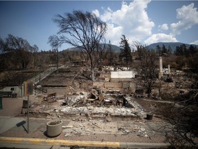 Damaged structures are seen in Lytton, B.C., on July 9, 2021, after a wildfire destroyed most of the village on June 30.