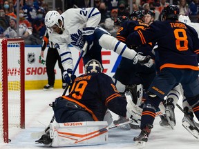 Toronto Maple Leafs’ Wayne Simmonds (24) scores on Edmonton Oilers goaltender Mikko Koskinen (19) at Rogers Place in Edmonton on Tuesday, Dec. 14, 2021.