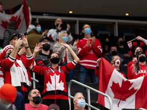 Team Canada fans celebrate Donovan Sebrango’s goal on Team Czechia’s goaltender Jakub Malek during first period IIHF World Junior Championship action at Rogers Place in Edmonton, on Sunday, Dec. 26, 2021.
