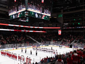 Team Canada players celebrate their 6-3 win over Team Czechia during the International Ice Hockey Federation world junior championship at Rogers Place in Edmonton on Dec. 26, 2021.