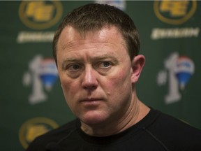EDMONTON, ALBERTA: November 24, 2014  - Eskimos Coach Chris Jones speaks to media at Commonwealth stadium on November 24, 2014 after their season ended with a loss Sunday in the Western Final to the Calgary Stampeders. Topher Seguin/Edmonton Journal