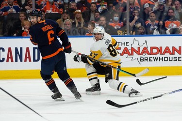 Pittsburgh Penguins' Sidney Crosby (87) breaks his stick shooting on Edmonton Oilers' goaltender Mikko Koskinen (19) during second period NHL action at Rogers Place in Edmonton, on Wednesday, Dec. 1, 2021.
