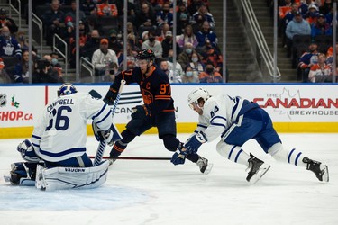 Edmonton Oilers' Connor McDavid (97) is stopped by Toronto Maple Leafs' goaltender Jack Campbell (36) during first period NHL action at Rogers Place in Edmonton, on Tuesday, Dec. 14, 2021.