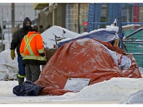A homeless encampment on 100 Street near 106 Avenue in Edmonton on Wednesday, Dec. 29, 2021.