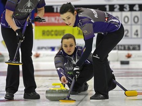 Skip Kelsey Rocque delivers a rock as second Taylor McDonald keeps a close eye on it at the 2018 Pinty's Grand Slam of Curling, Meridian Canadian Open held in Camrose on Jan. 16, 2018.