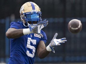 Winnipeg Blue Bombers defensive lineman Willie Jefferson (5) catches a pass during practice in Hamilton, Ont., Friday, Dec. 10, 2021. Winnipeg will meet the Hamilton Tiger-Cats in the 108th CFL Grey Cup game.