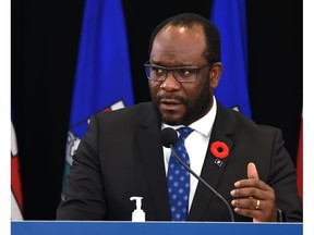 Justice Minister and Solicitor General Kaycee Madu provides details about Bill 81, the Election Statutes Amendment Act, during a news conference in Edmonton, Nov. 4, 2021.