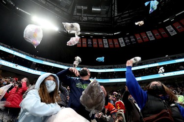 Fans throw teddy bears on to the ice following a goal during the Oil Kings' 14th annual Teddy Bear Toss, in Edmonton Saturday Dec. 4, 2021. Photo by David Bloom



The Edmonton Oil Kings' e battle the Moose Jaw Warriors' m during first period WHL action at Rogers Place, in Edmonton Saturday Dec. 4, 2021.