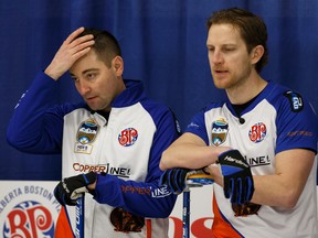 Skip Ted Appelman and third Nathan Connolly react during the championship game of the 2019 Alberta Boston Pizza Cup championship against the Kevin Koe rinks at Ellerslie Curling Club in Edmonton on Feb. 10, 2019.