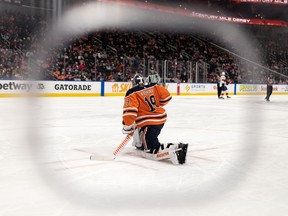 Edmonton Oilers goaltender Mikko Koskinen (19) stretches while playing the Florida Panthers at Rogers Place in Edmonton on Thursday, Jan. 20, 2022.