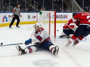 Edmonton Oil Kings defenceman Luke Prokop (6) earns an assist with a quick pass to Dylan Guenther, who scores on Lethbridge Hurricanes goaltender Jared Picklyk (31) at Rogers Place in Edmonton on Sunday, Jan. 30, 2022.