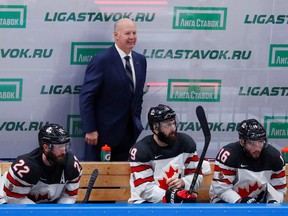 Canada coach Claude Julien will not be travelling to China for the Olympics after slipping and breaking his ribs.