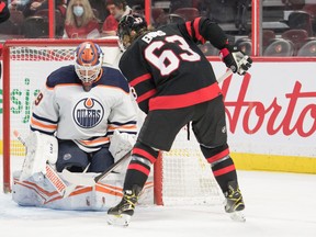 Edmonton Oilers goalie Mikko Koskinen makes a save in front of Senators  winger Tyler Ennis during the first period on Monday night at the Canadian Tire Centre in Ottawa.