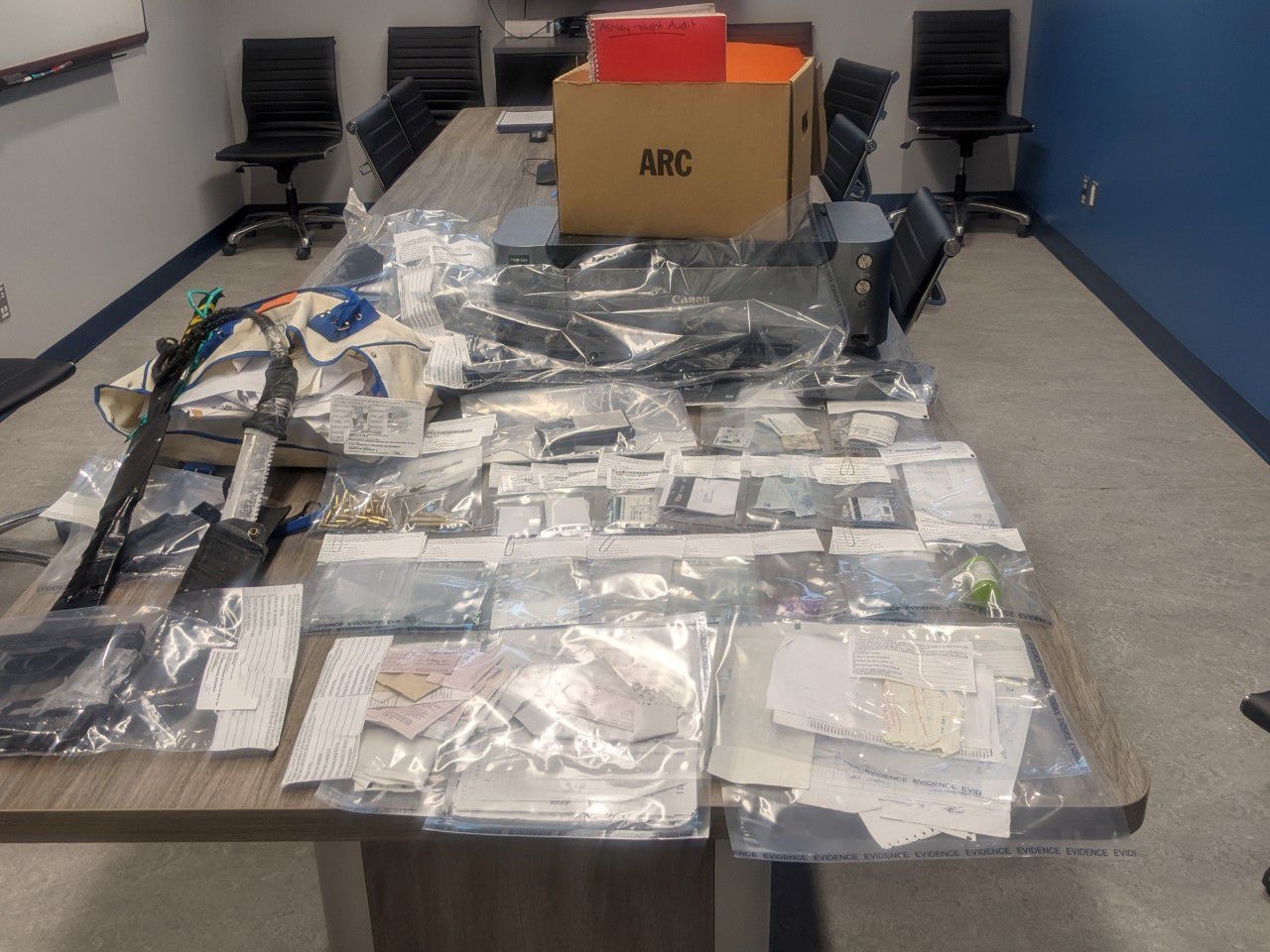 Two charged after Vegreville RCMP seize weapons, drugs, counterfeit documents