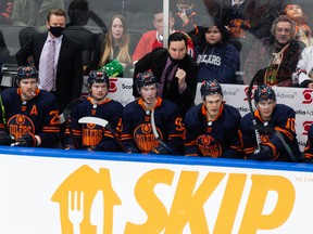 Edmonton Oilers head coach Jay Woodcroft, directs traffic behind the bench as the team plays the New York Islanders at Rogers Place in Edmonton on Feb. 11, 2022.