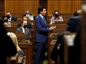 Prime Minister Justin Trudeau speaks in the House of Commons about the implementation of the Emergencies Act as truckers and their supporters continue to protest against coronavirus disease (COVID-19) vaccine mandates in Ottawa February 17, 2022.