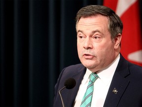 Premier Jason Kenney provides an update on COVID-19 restrictions from the McDougall Centre in Calgary on Tuesday, Feb. 8, 2022.