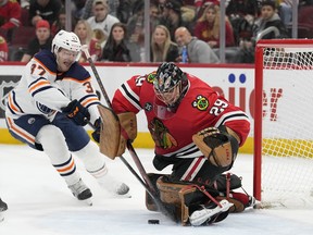 Marc-Andre Fleury (29) of the Chicago Blackhawks makes a save against Warren Foegele (37) of the Edmonton Oilers at United Center on Thursday, March 3, 2022, in Chicago, Il.