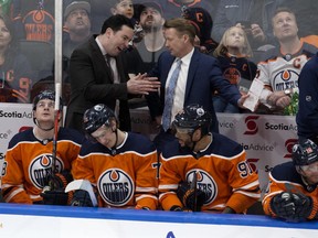 The Edmonton Oilers' Head Coach Jay Woodcroft (top left) runs the bench during first period NHL action against the New Jersey Devils at Rogers Place in Edmonton on Saturday March 19, 2022.